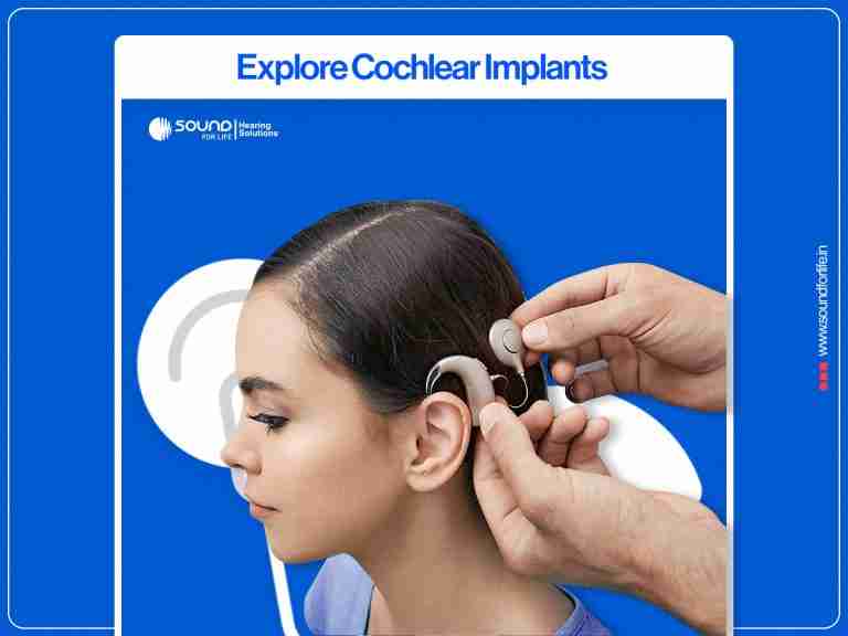 A professional fitting a sound processor and transmitter coil of a cochlear implant behind a young woman's ear against a blue promotional background with the heading "Explore Cochlear Implants